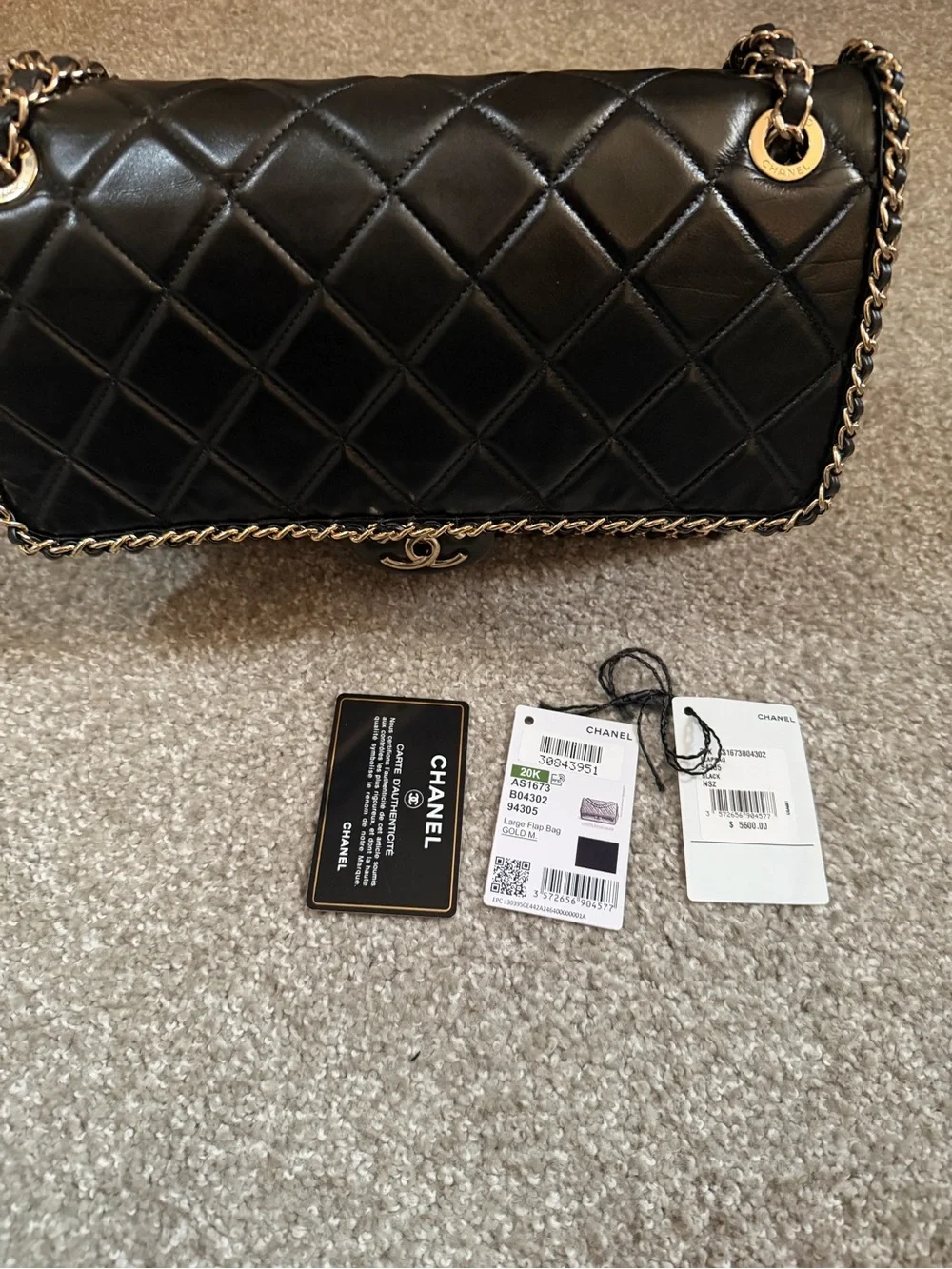 CHANEL Black Quilted Leather Shoulder Bag with Gold Hardware